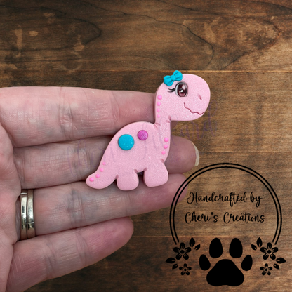 Pink Dino Bow Center – Handmade Polymer Clay Embellishment