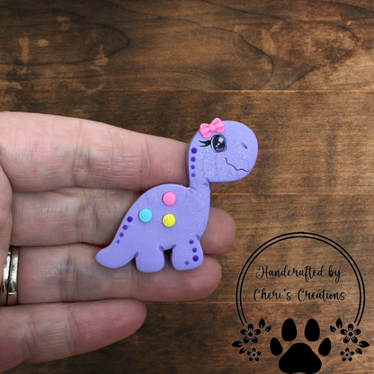 Purple Dino Bow Center – Handmade Polymer Clay Embellishment