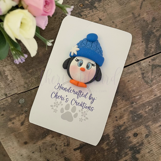 Blue Hat Penguin Bow Center – Handmade Polymer Clay Embellishment