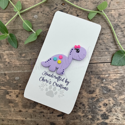 Purple Dino Bow Center – Handmade Polymer Clay Embellishment
