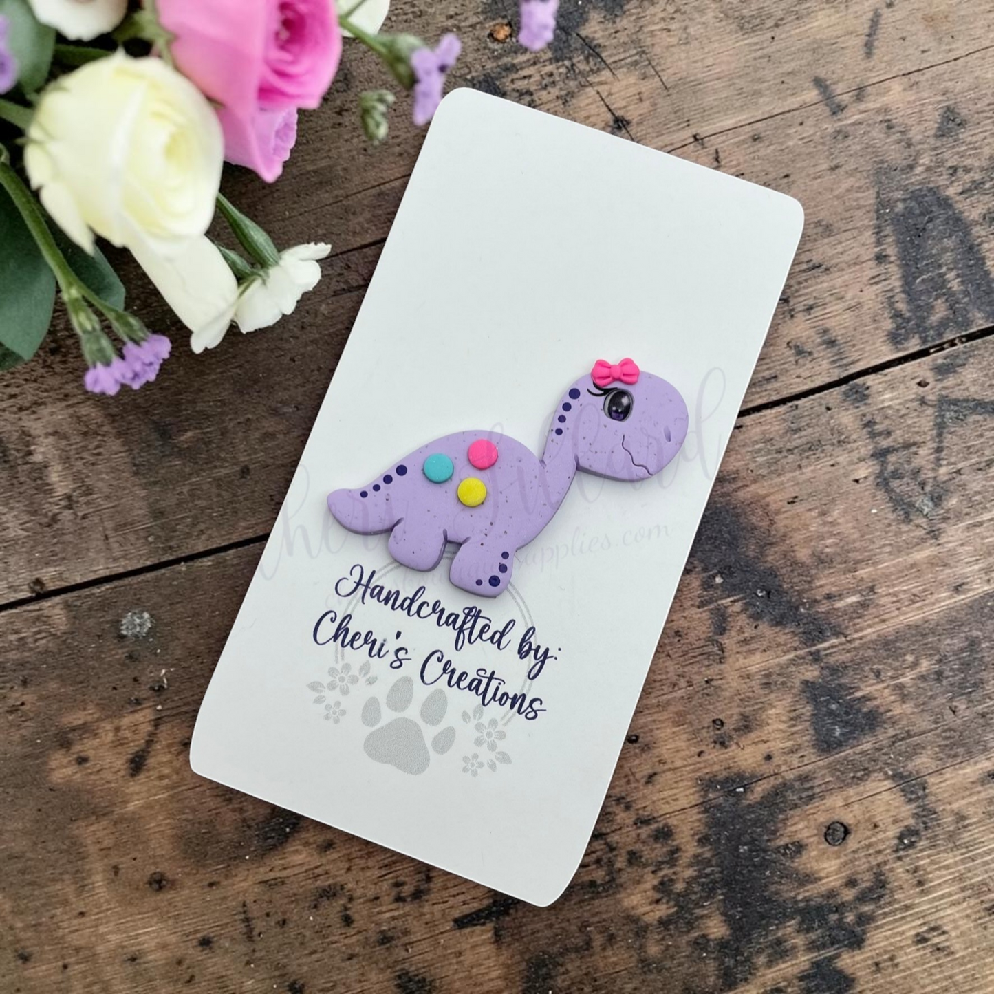Purple Dino Bow Center – Handmade Polymer Clay Embellishment