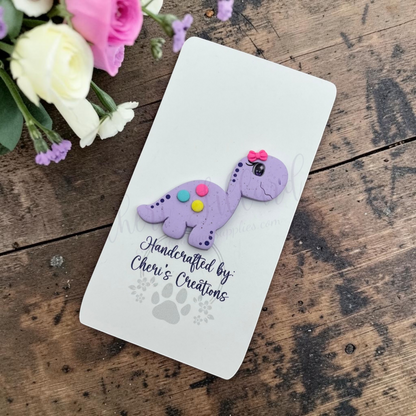 Purple Dino Bow Center – Handmade Polymer Clay Embellishment
