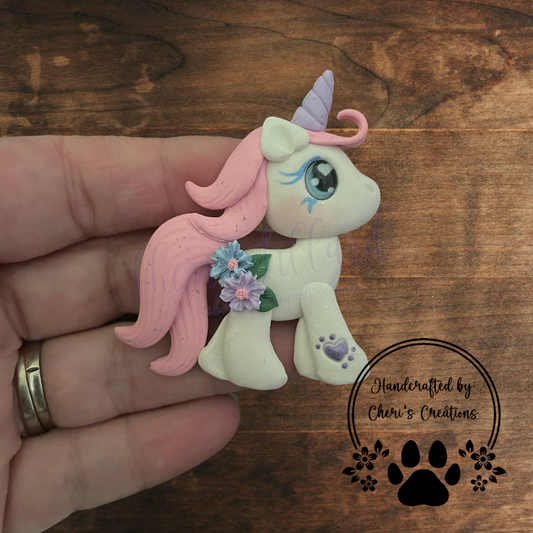 Winter Floral Unicorn Bow Center – Handmade Polymer Clay Embellishment